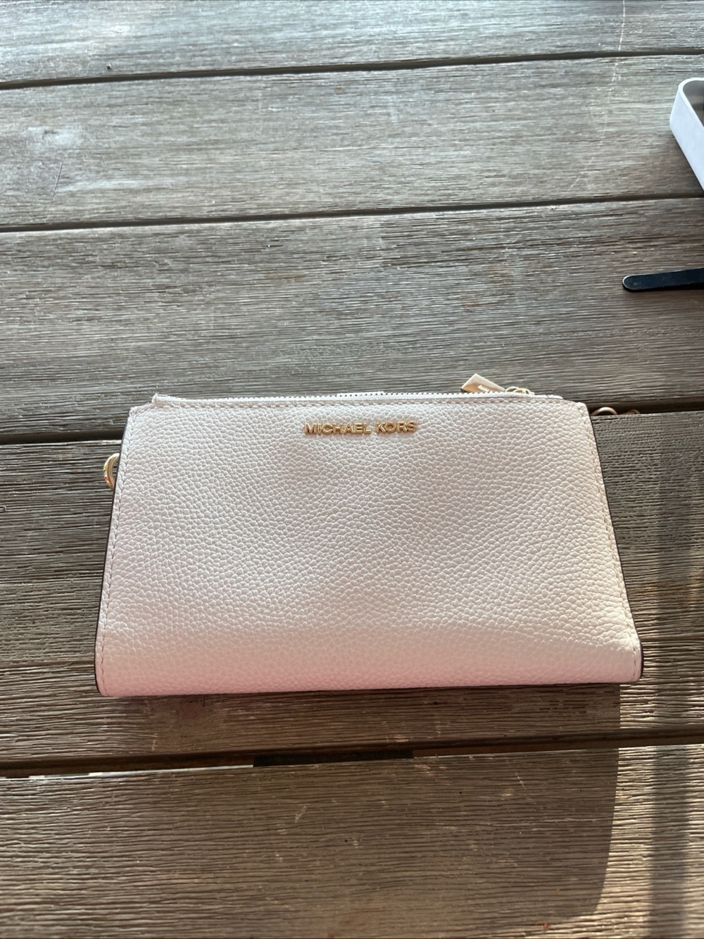 Michael Kors Pale Pink Pebbled Leather Wristlet Wallet with Gold Logo